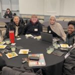 Group of employees at table