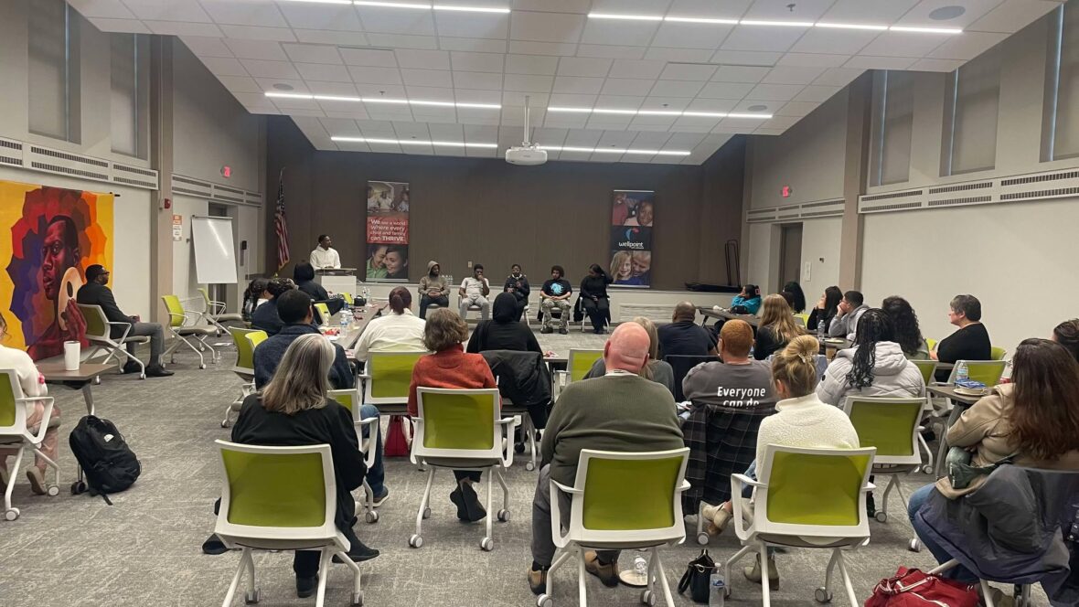 audience attending a panel