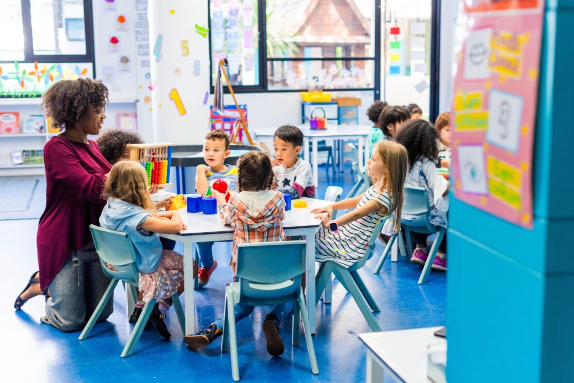 children and teacher in classroom