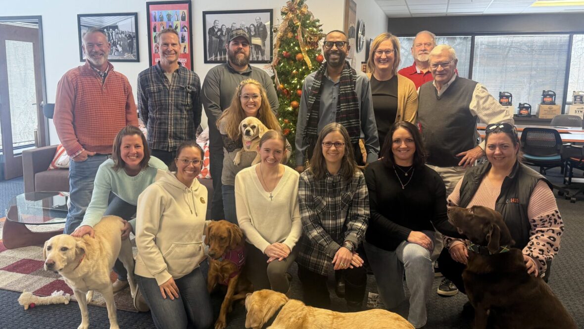 group of people in front of tree