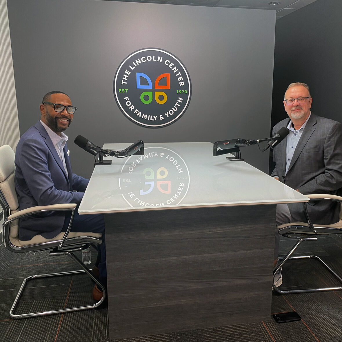 two people talking on podcast