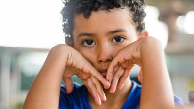 young boy looking sad