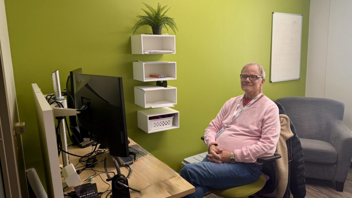 Dr Schnell sitting at desk