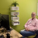 Dr Schnell sitting at desk