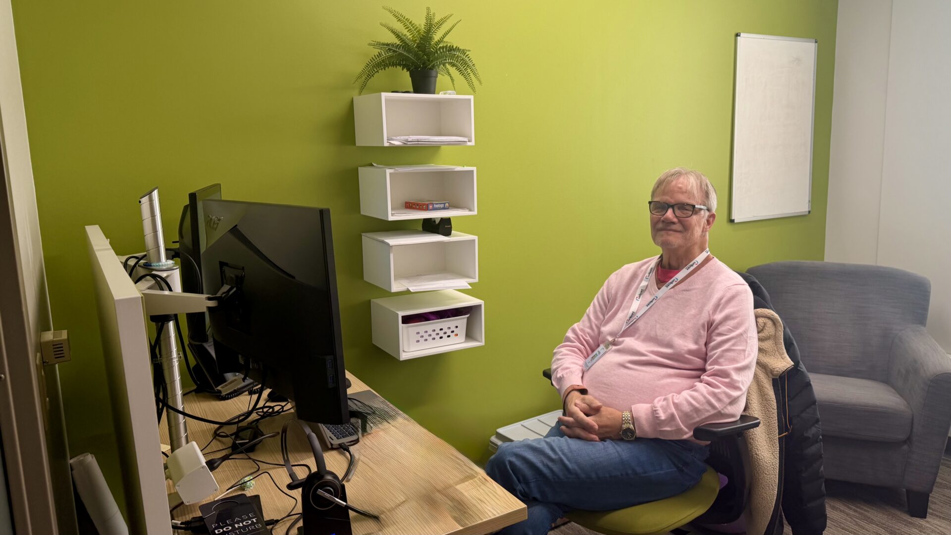 Dr Schnell sitting at desk